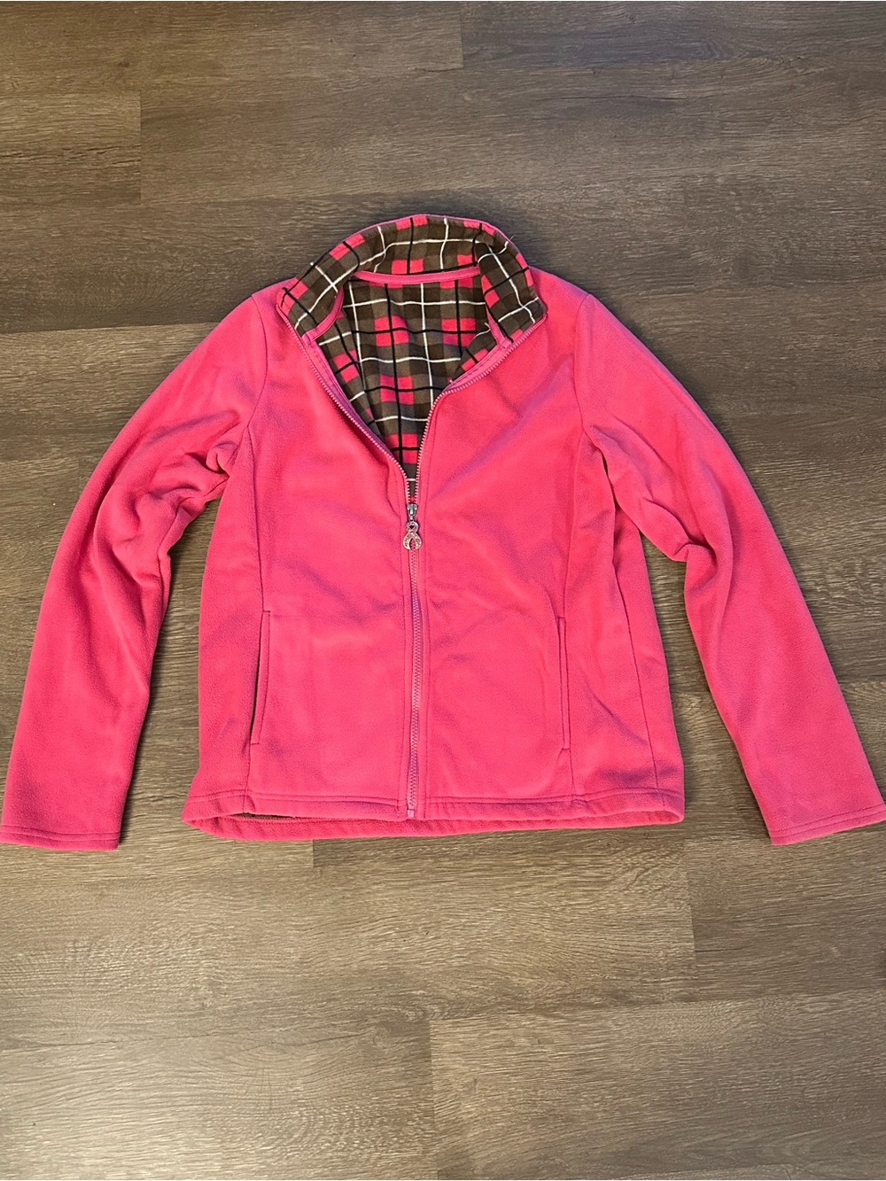 Pink fleece jacket with plaid lining